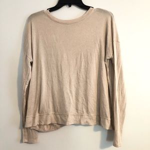 flowy cream long sleeve with opening back